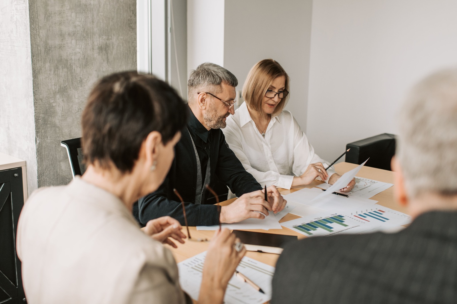 Business partners reviewing a proposal together